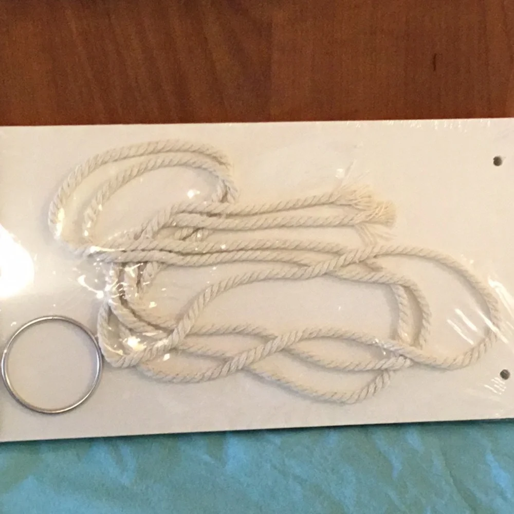 Hanging wall shelf. New in package